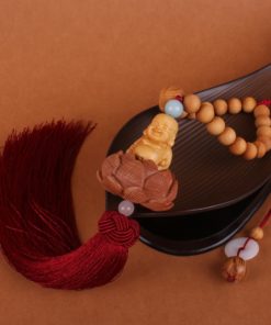 Khánh treo ô tô mặt Phật điêu khắc ý nghĩa