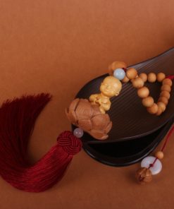 Khánh treo ô tô mặt Phật điêu khắc ý nghĩa