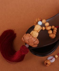 Khánh treo ô tô mặt Phật điêu khắc ý nghĩa