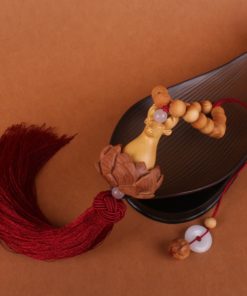 Khánh treo ô tô mặt Phật điêu khắc ý nghĩa