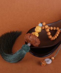 Khánh treo ô tô mặt Phật điêu khắc ý nghĩa