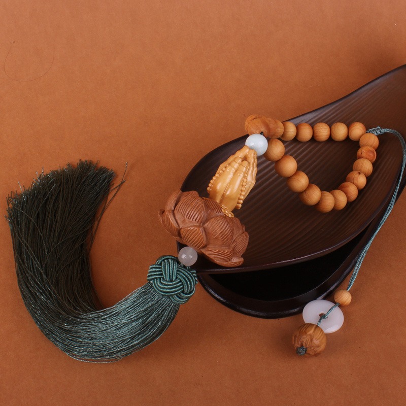 3_O1CN01RIrrs01DJLwSy92YZ_!!3985600195-0-cib Khánh treo ô tô mặt Phật điêu khắc ý nghĩa