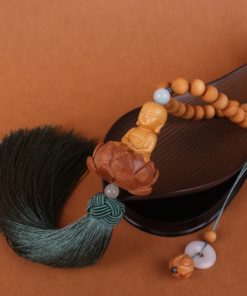 Khánh treo ô tô mặt Phật điêu khắc ý nghĩa