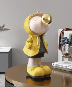 Tượng cậu bé thổi bóng cho bé