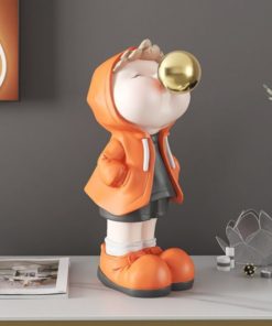 Tượng cậu bé thổi bóng cho bé