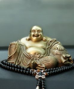 Tượng Di Lặc bằng đồng để oto ý nghĩa