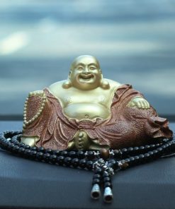 Tượng Di Lặc bằng đồng để oto ý nghĩa