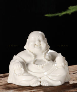 Tượng Di Lặc để xe hơi mang tài lộc