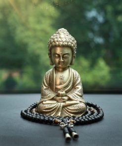 Tượng Phật A Di Đà để trên taplo xe hơi