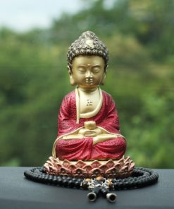 Tượng Phật A Di Đà để trên taplo xe hơi