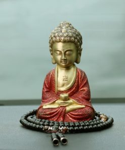 Tượng Phật A Di Đà để trên taplo xe hơi